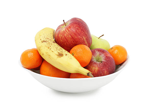 frutas frescas en tazón blanco - tazón para frutas fotografías e imágenes de stock