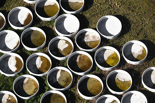 Aerial view of concrete pots ready for a variety of future applications and uses.