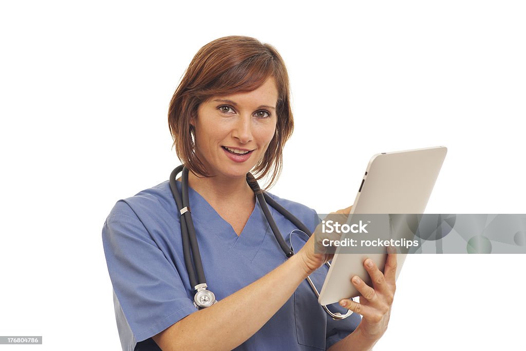 Mulher médico usando um tablet de computador de tela de toque - Foto de stock de Adulto royalty-free