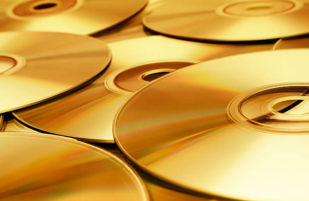 texture disc (gold - digital video disk photos et images de collection