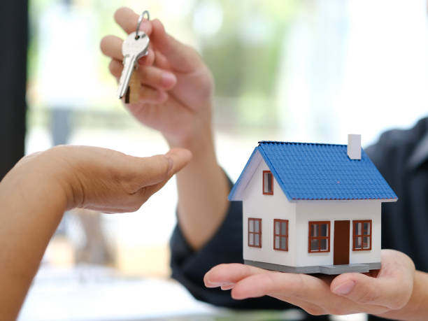 istock Providing customers with a model home in hand and with keys 1768061015