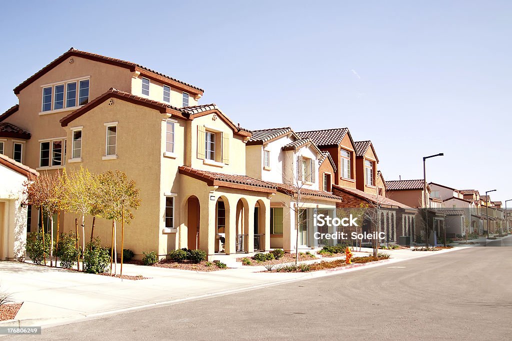 Quiet suburban neighborhood Suburban houses in a quiet southwestern neighborhood House Stock Photo