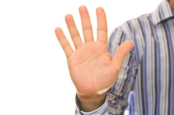 istock Man in striped shirt showing hand 176806655