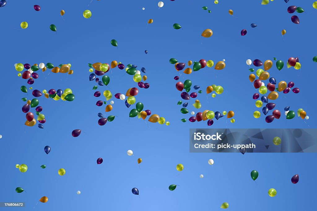 Free In The Sky Free spelled out in the sky with balloons. Balloon Stock Photo