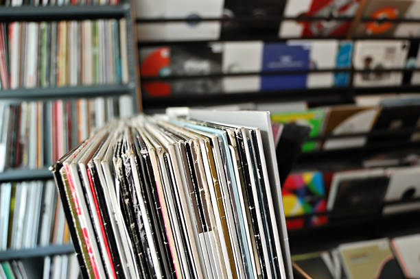 vinyl records at record store Vinyl music audio records with colorful sleeves at record store. Selective focus. dubstep photos stock pictures, royalty-free photos & images