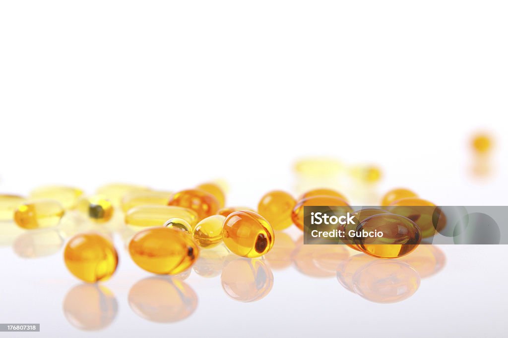 Gelb und orange Pillen - Lizenzfrei Alternative Medizin Stock-Foto