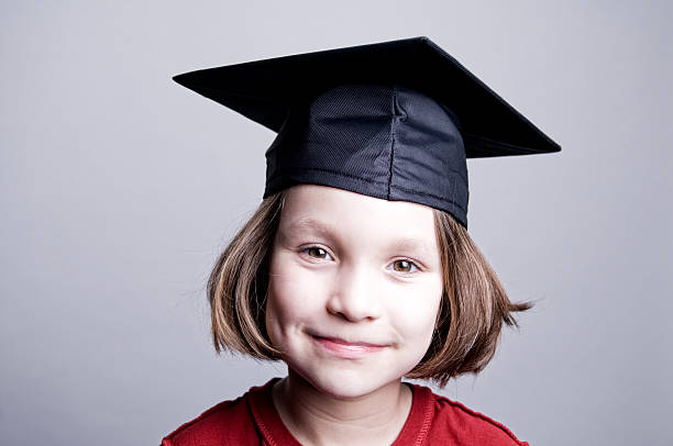 istock Little Girl, Graduation Cap 176807673