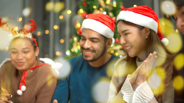 istock People enjoy a Christmas ceremony together. 1768078239