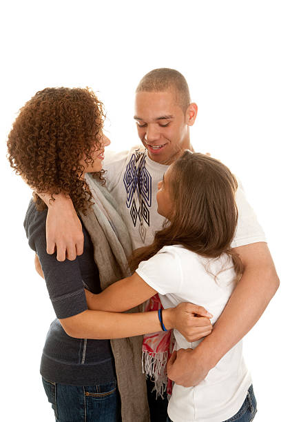 Mixed Race Brother and Sisters Hug