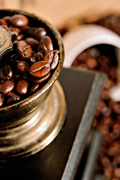 Fresh coffee Fresh coffee beans and an old coffee mash aromatisch stock pictures, royalty-free photos & images