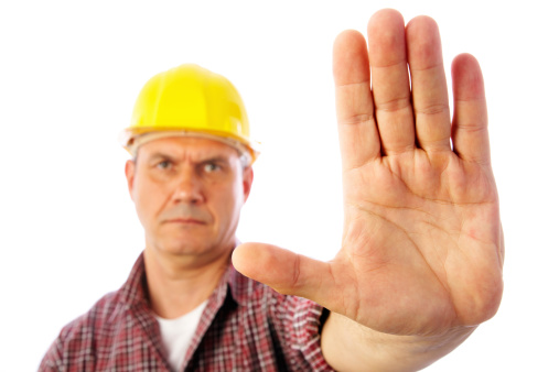 Close-up palm builder showing forbidding gesture stop