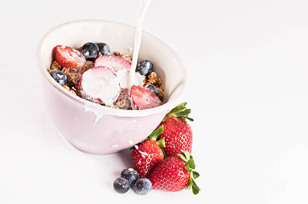 istock Granola Cereal With Pouring Milk 176812457