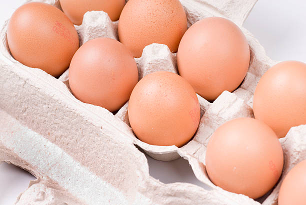 istock close up of eggs in a box carton 176813136