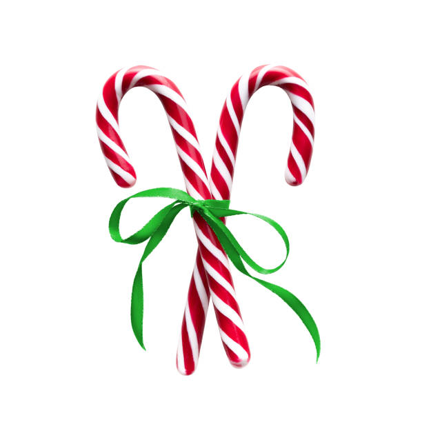 istock Candy canes with green Ribbon isolated on a white background 1768131520