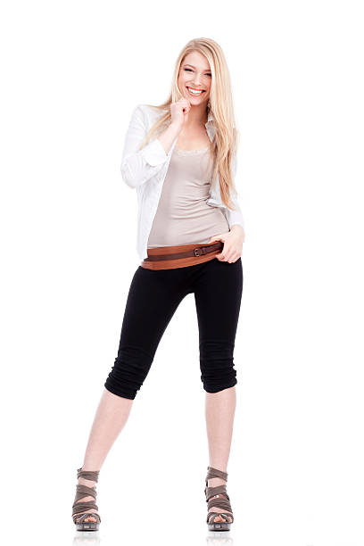 istock beautiful young woman standing 176813164