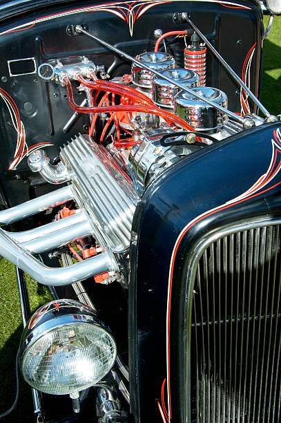 Street Rod 3 Details of the engine and graphics on a customized vehicle. cruising hot rods stock pictures, royalty-free photos & images