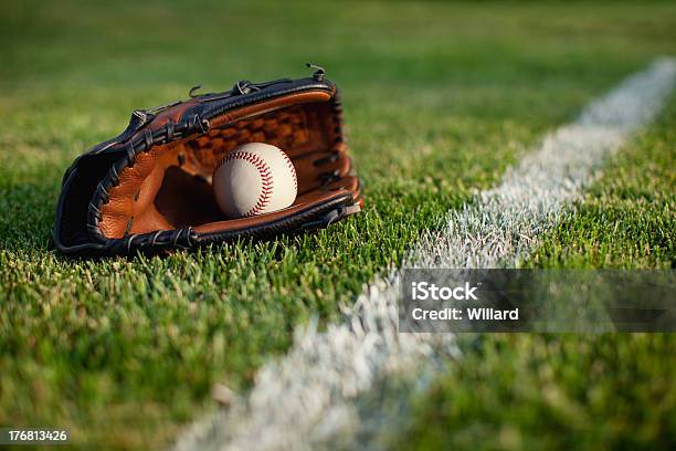 Baseball Mitt And Ball In Grass With Selective Focus Stock Photo - Download Image Now