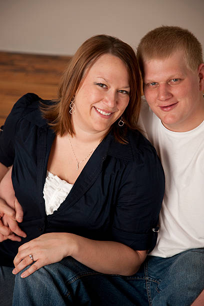 istock Engaged Couple Sitting Together 176813942