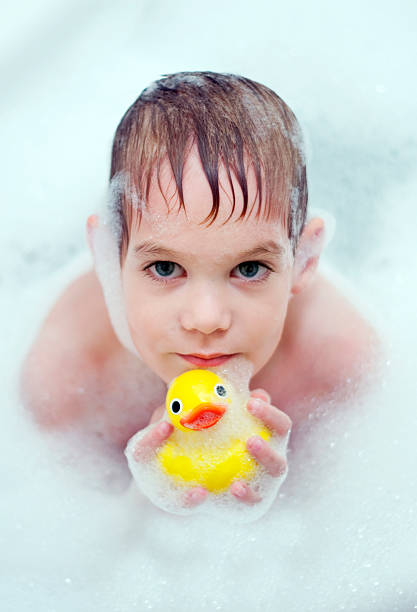 istock Little Caucasian Boy in Bath with Rubber Ducky 176815423