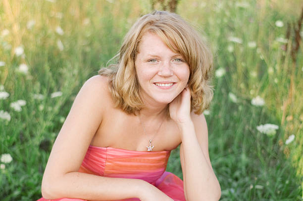 Casual smiling woman with long hair. 