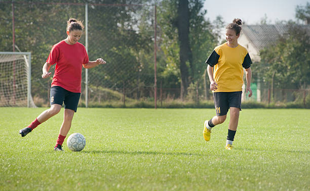 istock Girls playing soccer 176815511
