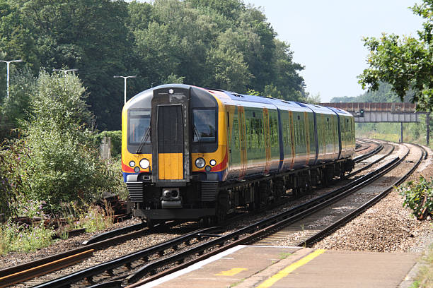 istock Electric passenger train, from station, transporting commuters into London, UK 176816769