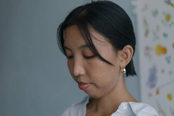 istock Side Profile Of Woman With Pixie Hair Cut 1768168327