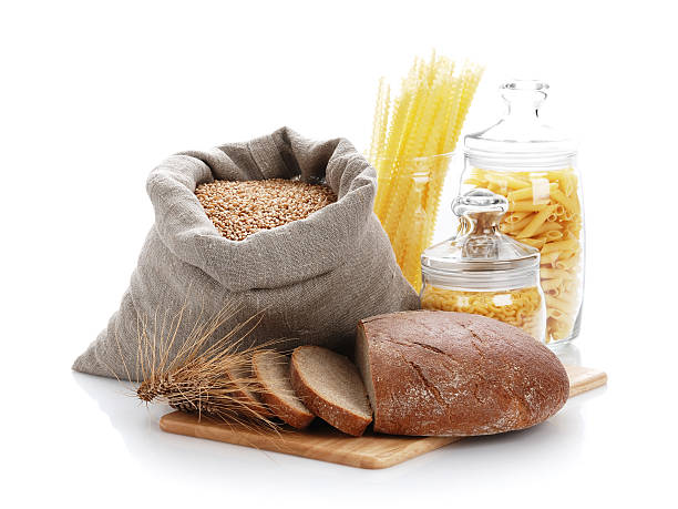 istock Bread, bag with wheat and macaroni in the container 176817044