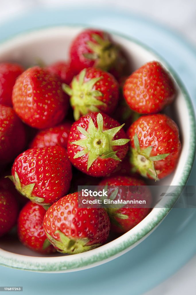 Fresh strawberries "Close-up of fresh, juicy strawberries in a bowl" Backgrounds Stock Photo