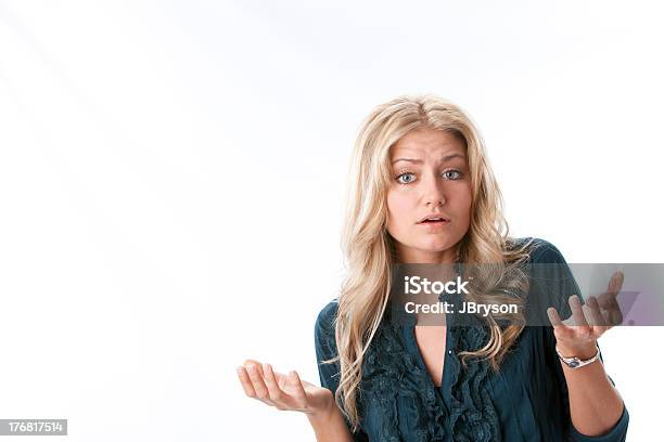 Caucasian Young Woman With Questioning Expression Stock Photo - Download Image Now - 20-24 Years, 20-29 Years, Adult