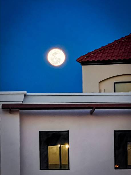 istock A full moon night in the city. 1768185566