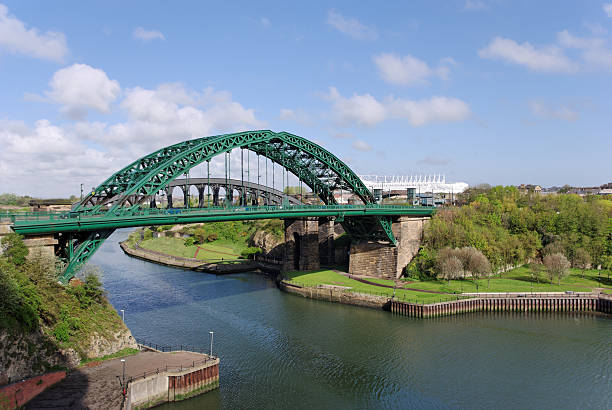 Wearmouth Bridge in Sunderland Wearmouth Bridges in Sunderland looking toward the Stadium of Light. Site of former shipyards used for urban development. Horizontal stock photo.Converted from Raw with minimal sharpening. river wear stock pictures, royalty-free photos & images