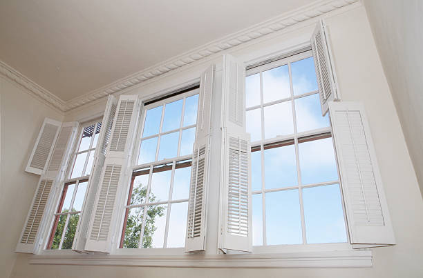 Windows and shutters Sky seen through windows with louver shutters shutter stock pictures, royalty-free photos & images