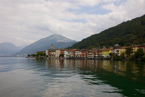 Brusino Asizio Village seen from the boat on a boat ride on lake Lugano from Lugano to Morcote.
