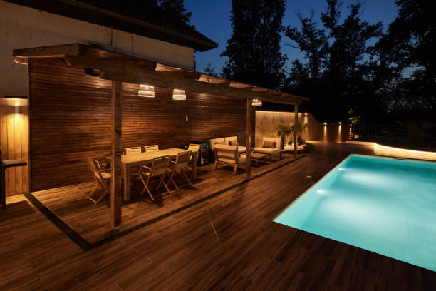 Modern family villa with swimming pool at night