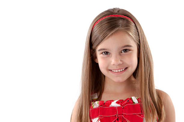 Headshot Adorable Girl Smiling with Long Hair Brown Eyes Headshot of adorable little girl with long brown hair and brown eyes. 6 7 years stock pictures, royalty-free photos & images