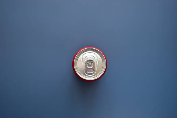 istock aluminium red cans soft drink put on blue texture background 1768208960