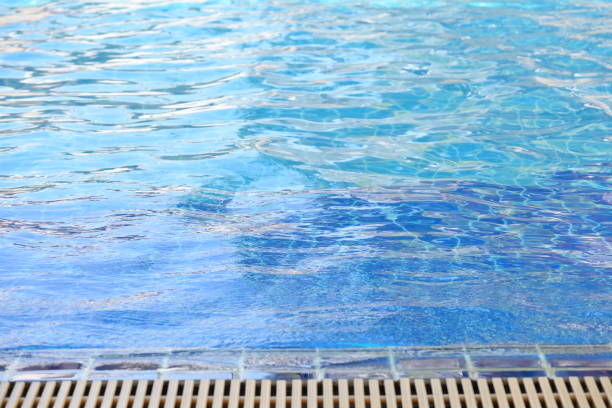 istock blue swimming pool texture background and surface of water 1768211703
