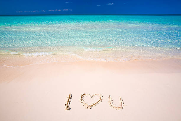 istock I Love You written in sand on beach, Caribbean 176821539