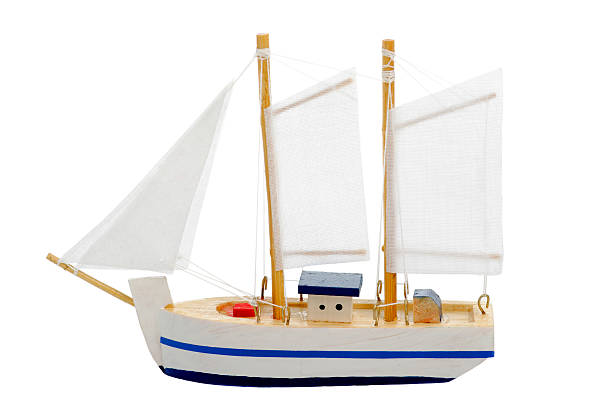 istock A wooden toy sail boat with three sails 176821893