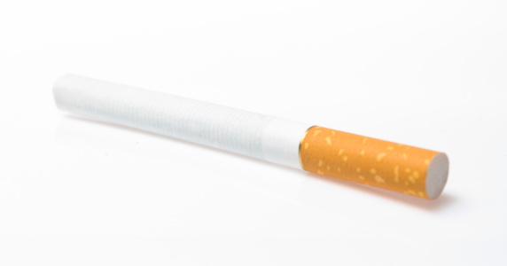 Classic cigarette isolated on the white background close-up