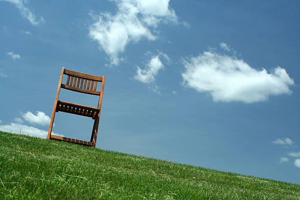 istock Wooden chair on a hilltop 176823673