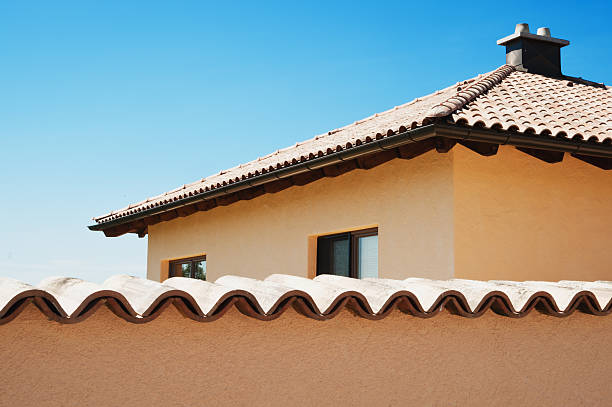 istock House behind boundary Fence 176823847