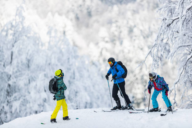 istock Group of friends talking before skiing and snowboarding on a mountain. 1768241663