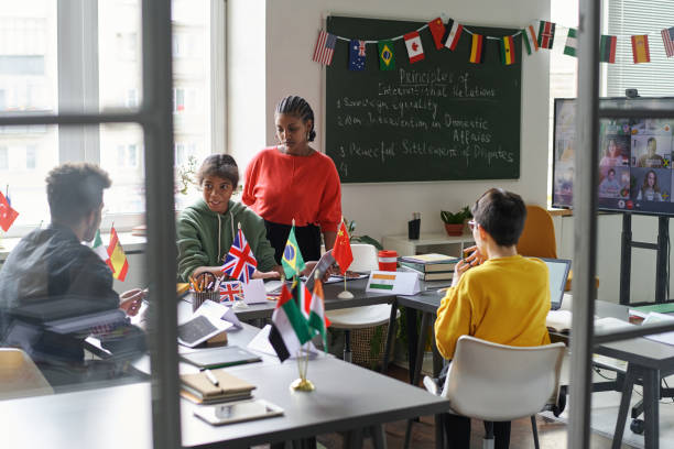 istock Students talking to teacher in the classroom 1768241895