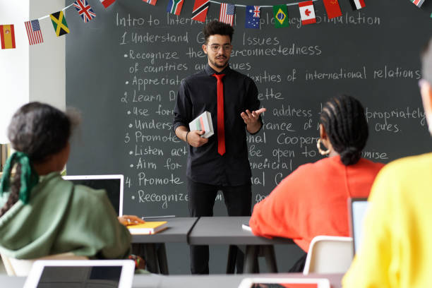 istock Teacher talking to students in the classroom 1768243132