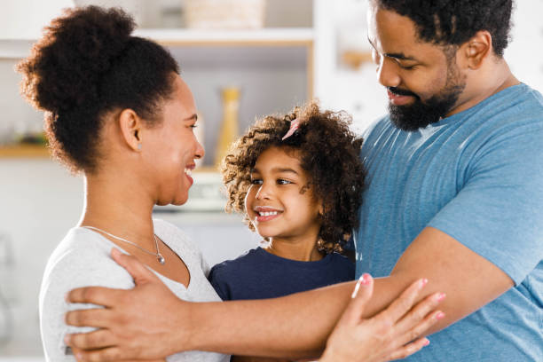 istock Loving black family communicating in the kitchen. 1768243801