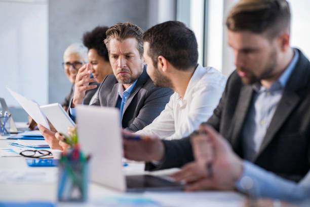 istock Businessmen working on touchpad and reports in the office. 1768243987