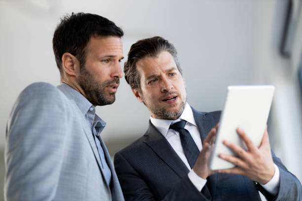 istock Businessmen working on touchpad in the office. 1768244000