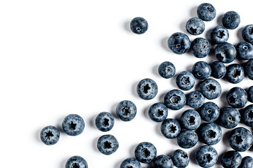Heap of blueberries, fresh juisy berries, isolated on white background